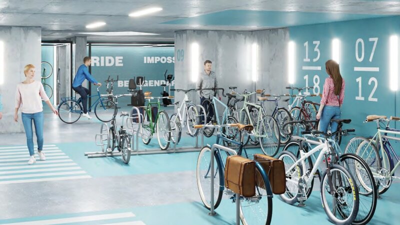 Innenansicht einer Fahrradgarage mit Fahrrädern und Menschen.